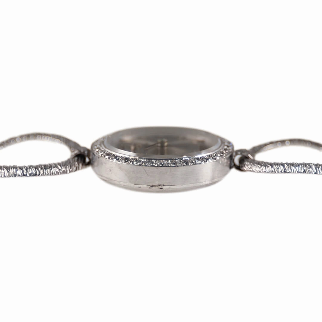 Omega 18k white gold cocktail watch with diamond bezel, 1964