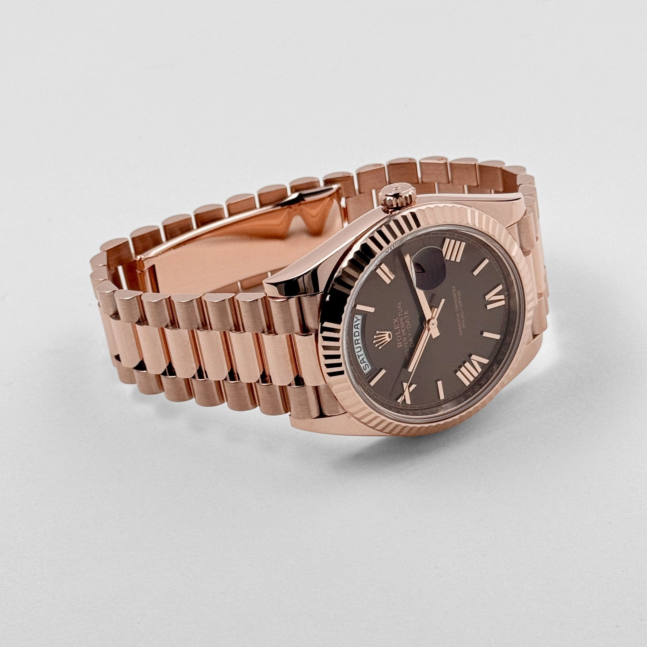 Rolex Day-Date 40 228235 Rose Gold Chocolate Roman Dial (2024)