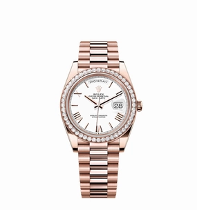 Rolex Day-Date 40 228235 Rose Gold White Roman Dial Diamond Bezel