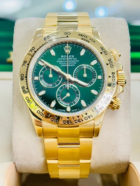 Rolex Daytona 116508 Known as the John mayer Cosmograph 40mm Yellow Gold Green Index Dial  Box and Papers PreOwned