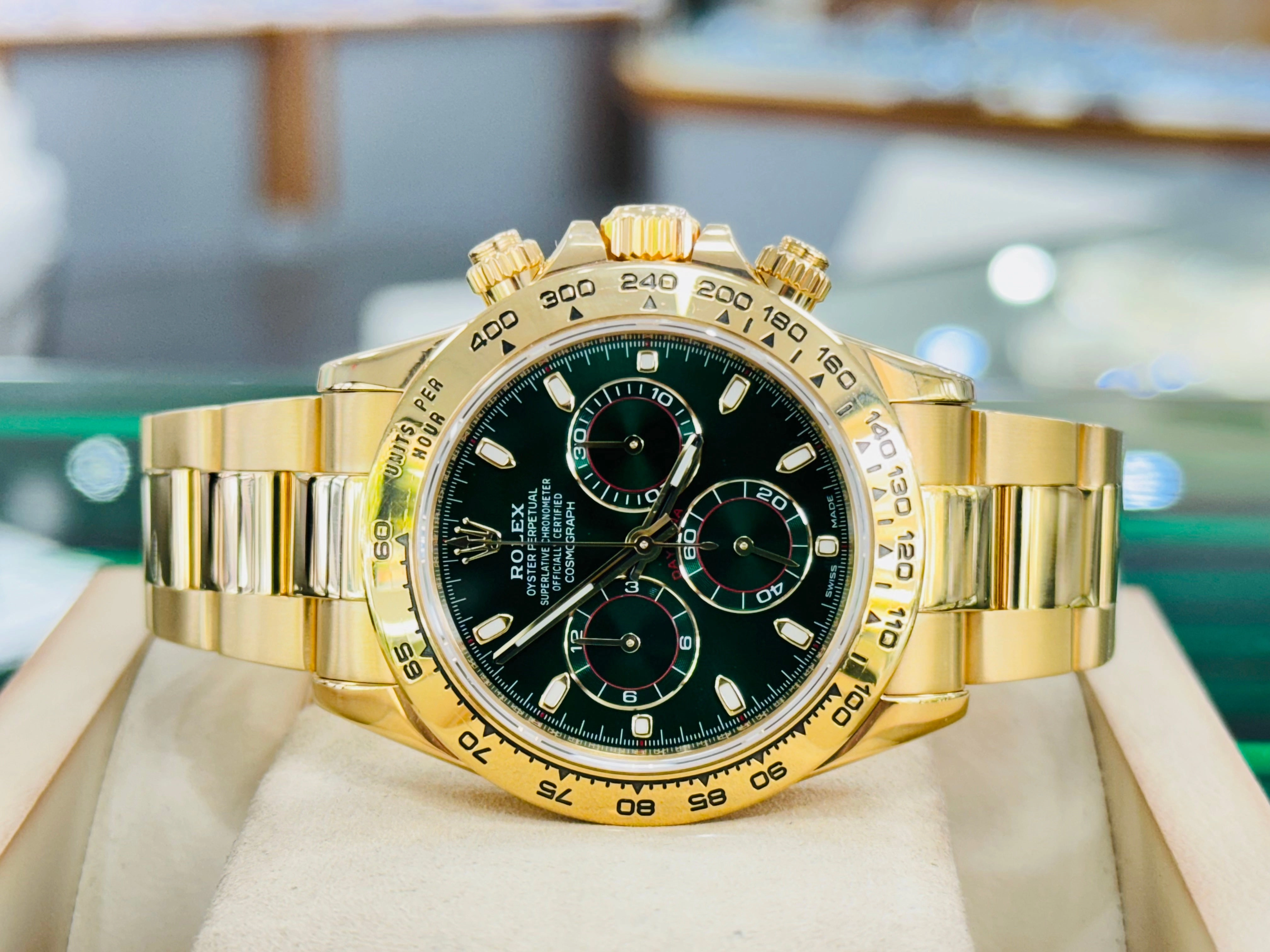 Rolex Daytona 116508 Known as the John mayer Cosmograph 40mm Yellow Gold Green Index Dial  Box and Papers PreOwned