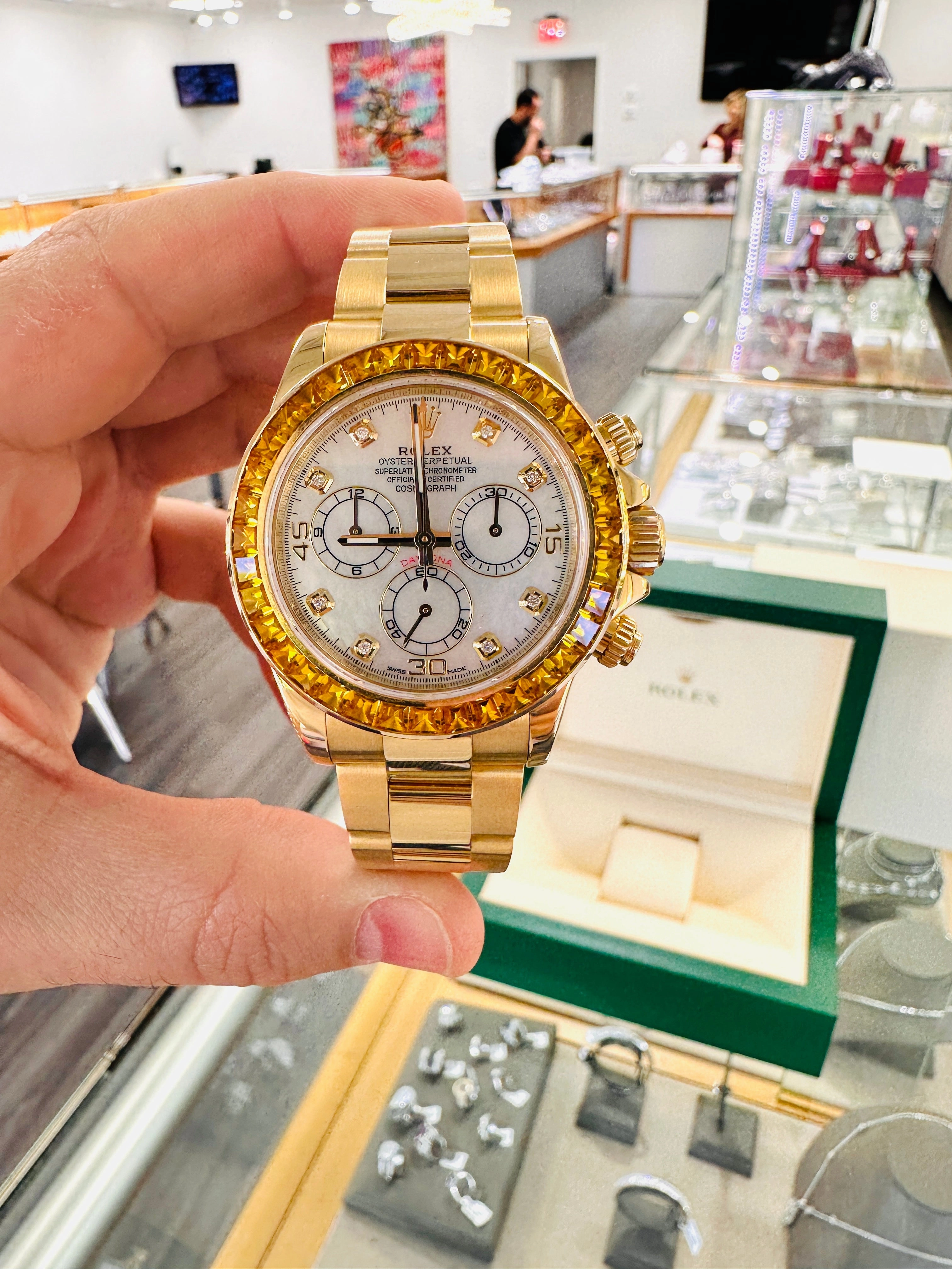 Rolex Daytona 116528 18K Yellow Gold Oyster Perpetual Cosmograph Custom Sapphire Bezel and Custom MOP Dial Box and Papers PreOwned