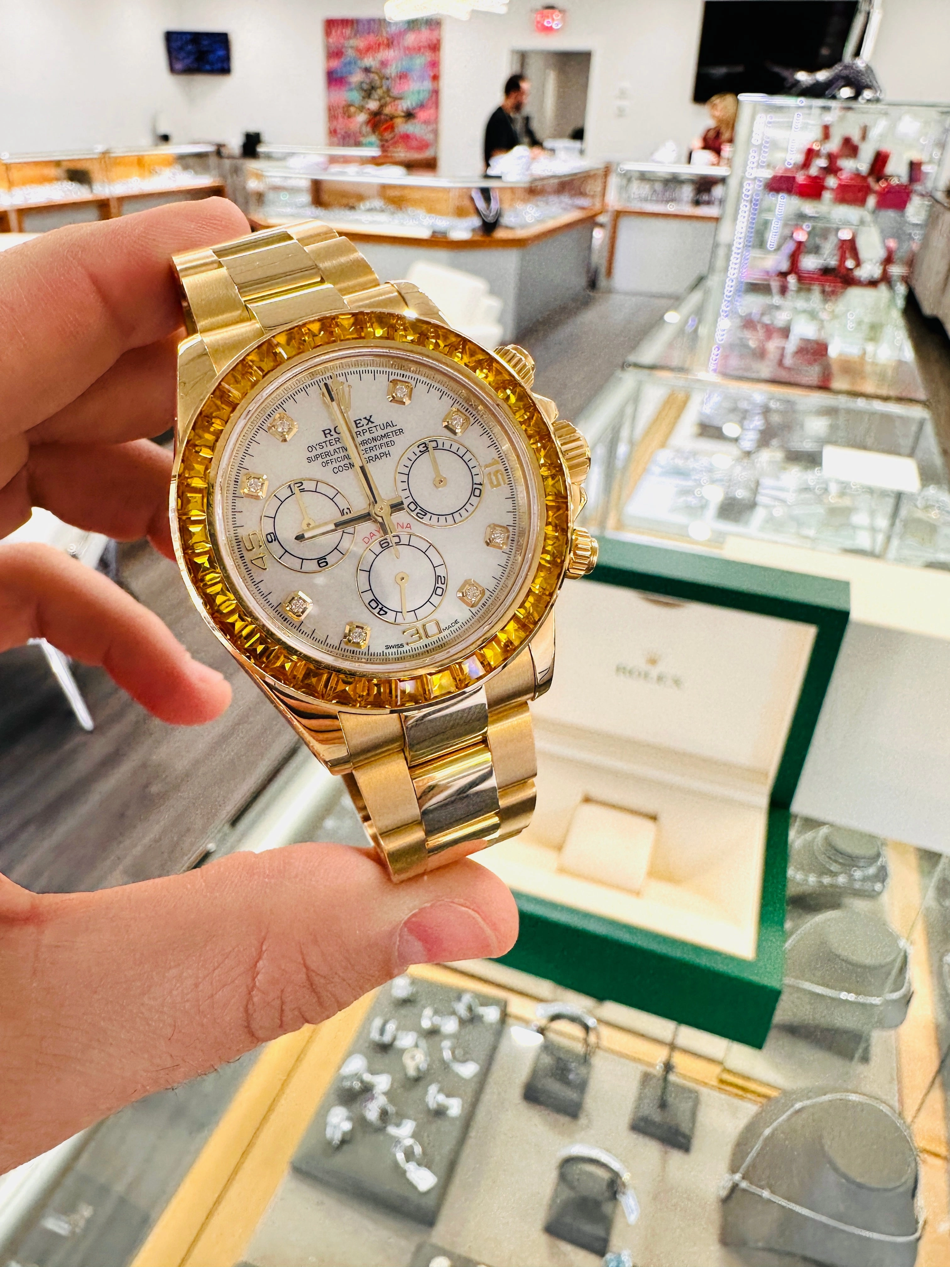 Rolex Daytona 116528 18K Yellow Gold Oyster Perpetual Cosmograph Custom Sapphire Bezel and Custom MOP Dial Box and Papers PreOwned