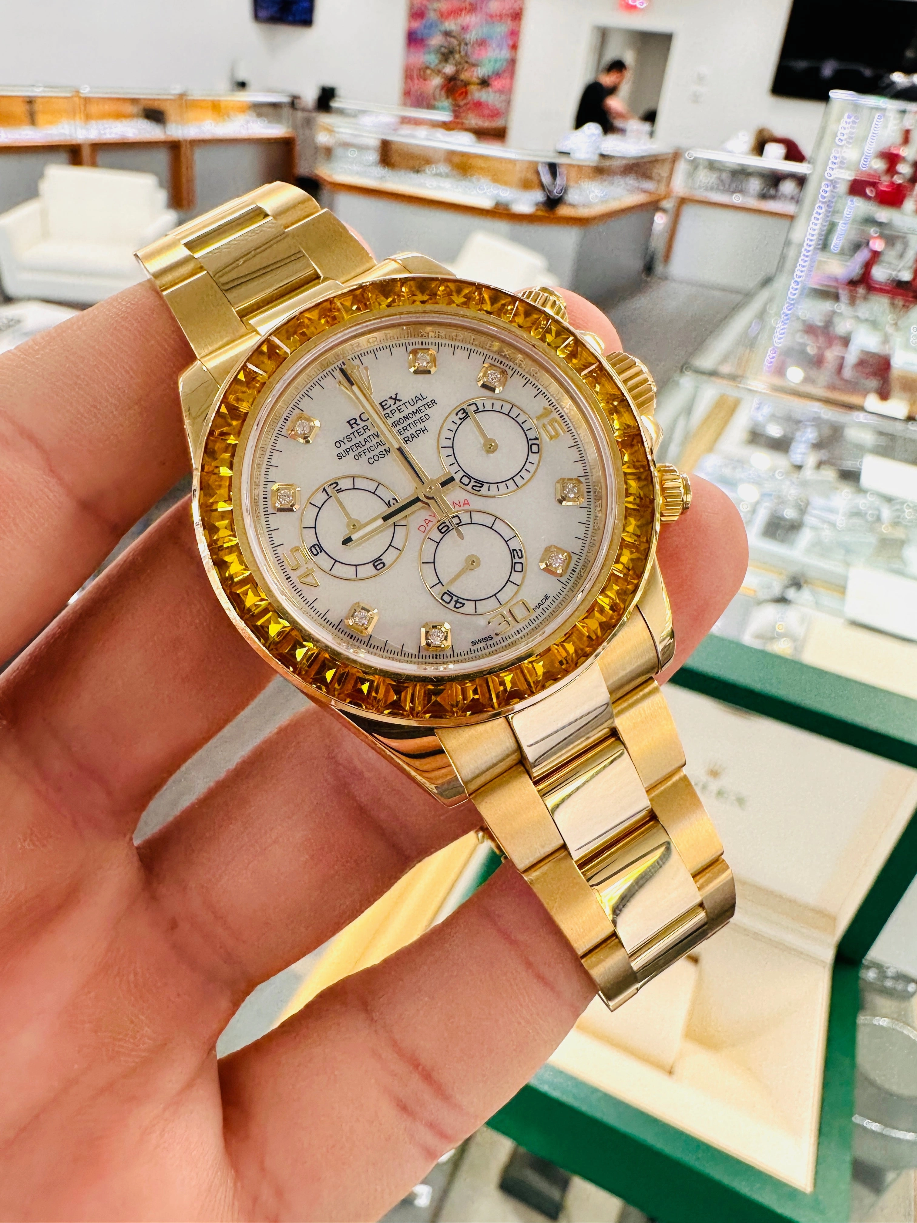 Rolex Daytona 116528 18K Yellow Gold Oyster Perpetual Cosmograph Custom Sapphire Bezel and Custom MOP Dial Box and Papers PreOwned