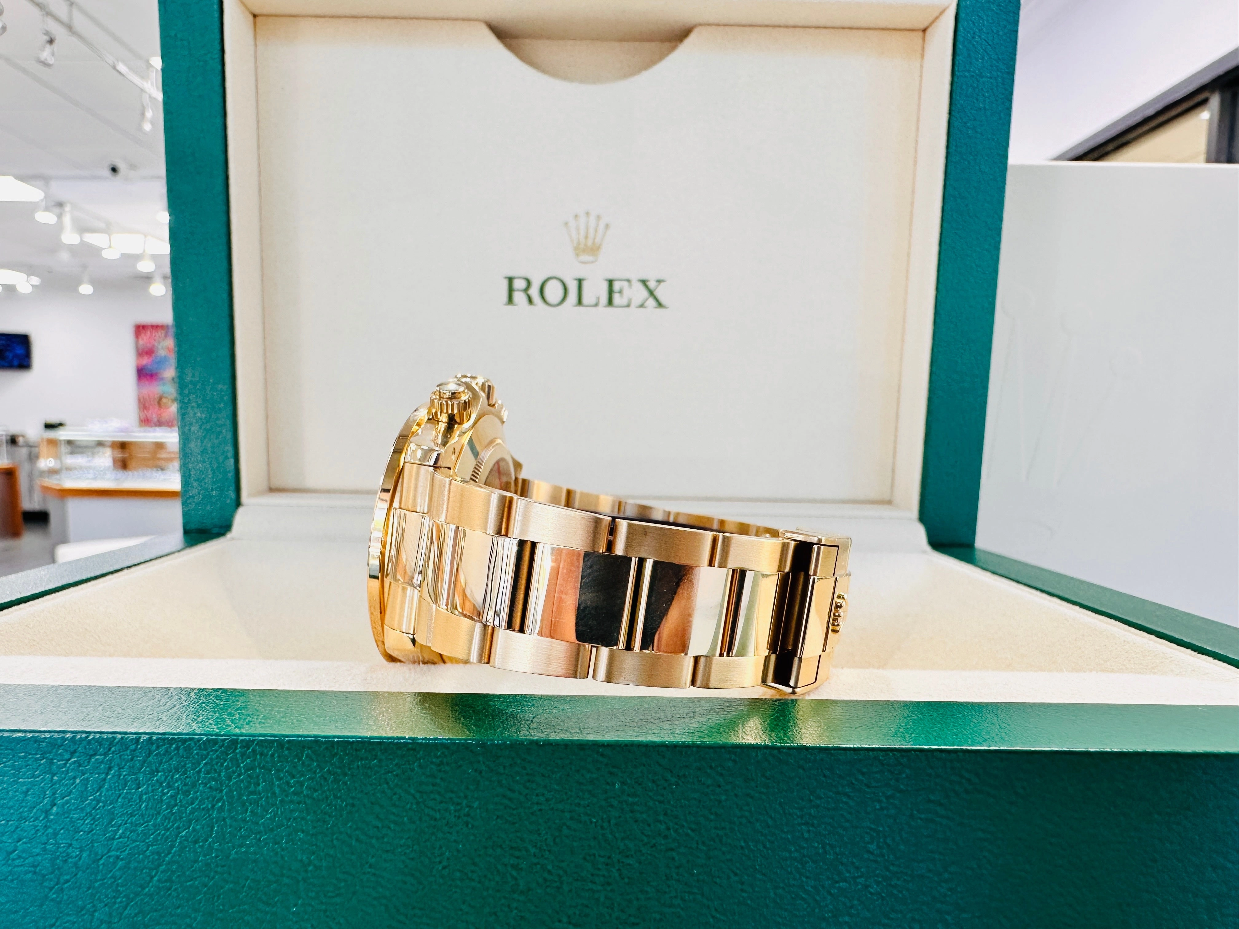 Rolex Daytona 116528 18K Yellow Gold Oyster Perpetual Cosmograph Custom Sapphire Bezel and Custom MOP Dial Box and Papers PreOwned