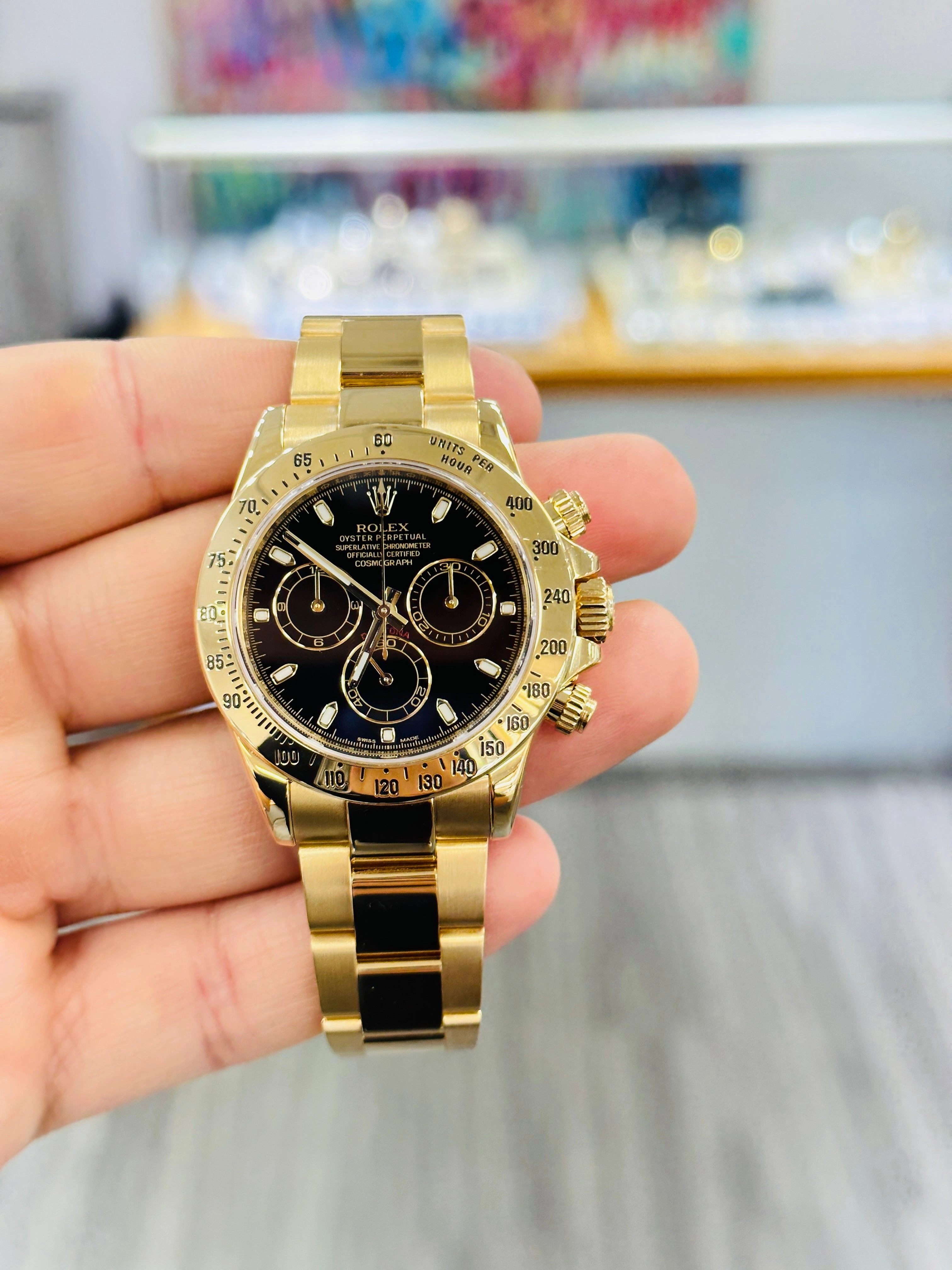 Rolex Daytona 116528 Black Dial Yellow Gold PreOwned Box