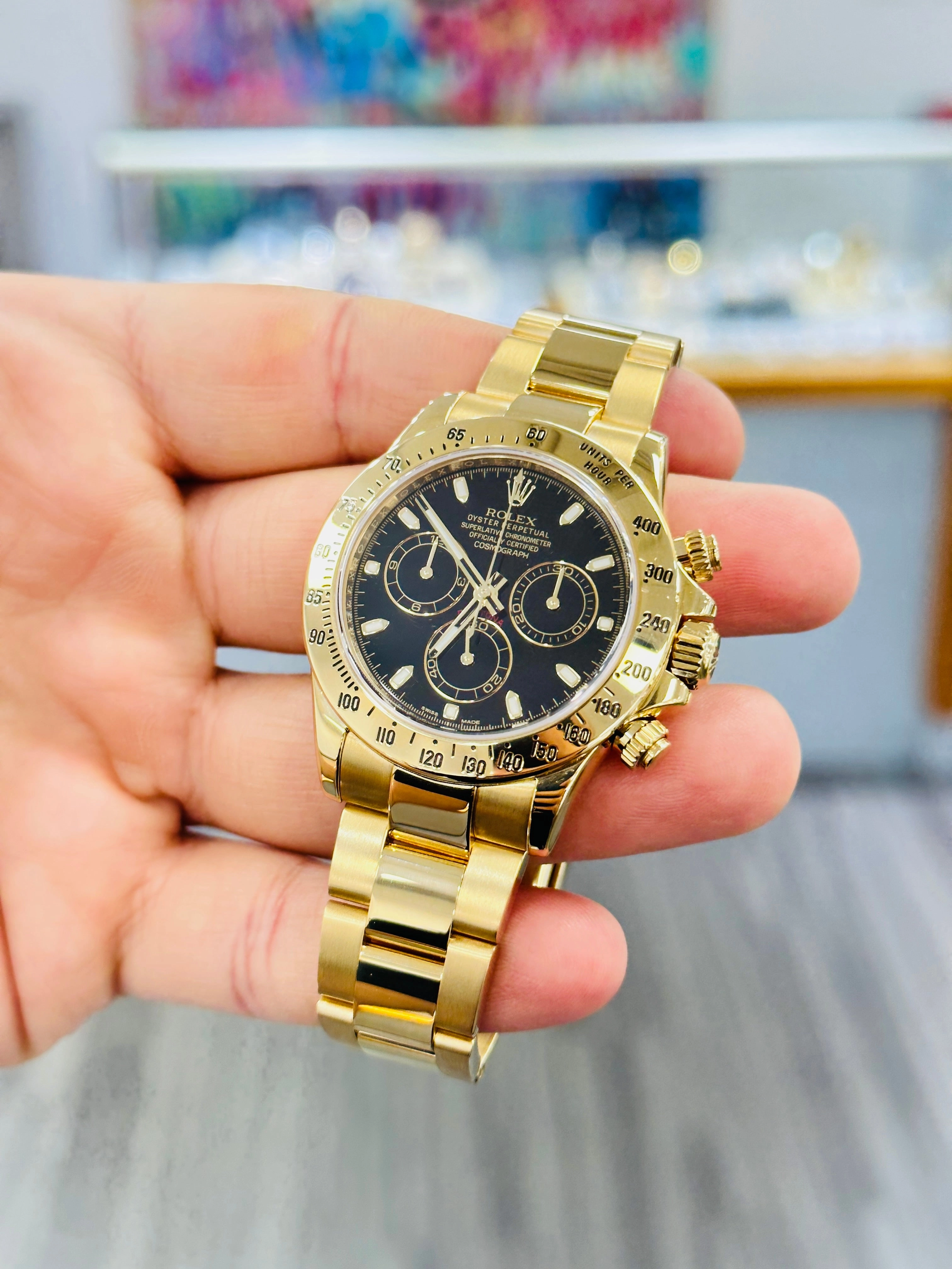 Rolex Daytona 116528 Black Dial Yellow Gold PreOwned Box